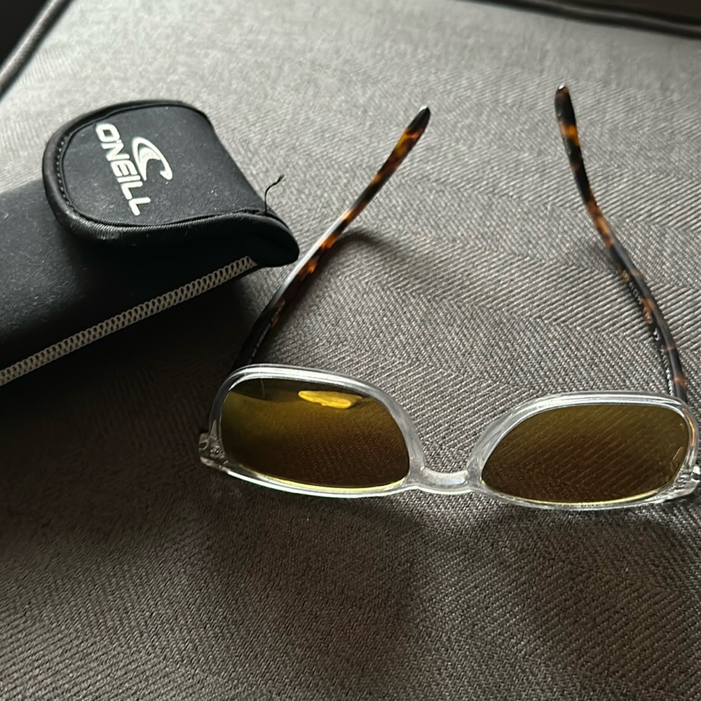 O’Neil Sunglasses CHAD RX, crystal clear front, tortoise bows, sold out.